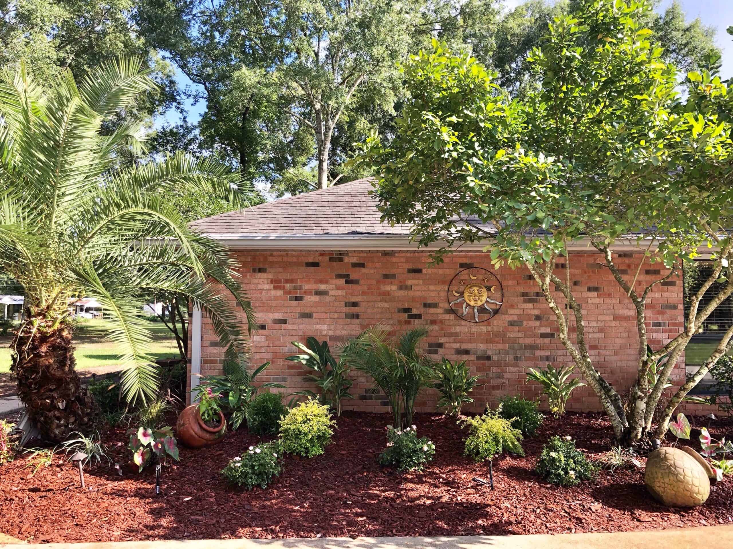Yard cleanups aftermath with mulch installation